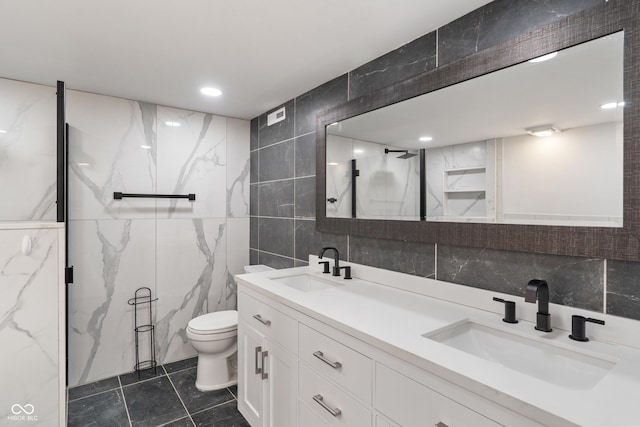 2263 N Rural St, Indianapolis, IN 46218 - full bathroom with tile walls, toilet, a marble finish shower, double vanity, and tile patterned flooring