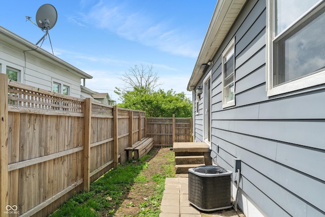 2263 N Rural St, Indianapolis, IN 46218 - view of yard featuring central AC unit