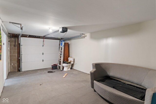 2263 N Rural St, Indianapolis, IN 46218 - garage featuring a garage door opener