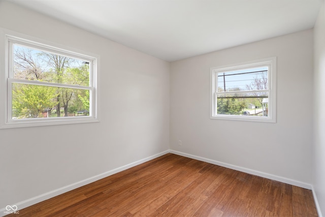 2263 N Rural St, Indianapolis, IN 46218 - spare room with plenty of natural light and baseboards