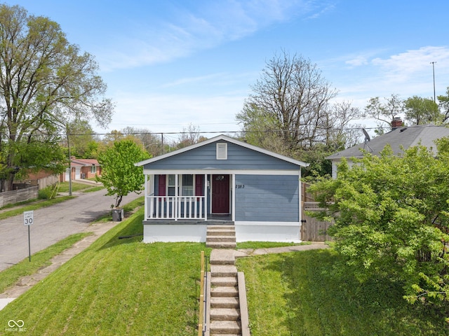 2263 N Rural St, Indianapolis, IN 46218 - view of front of home with a porch