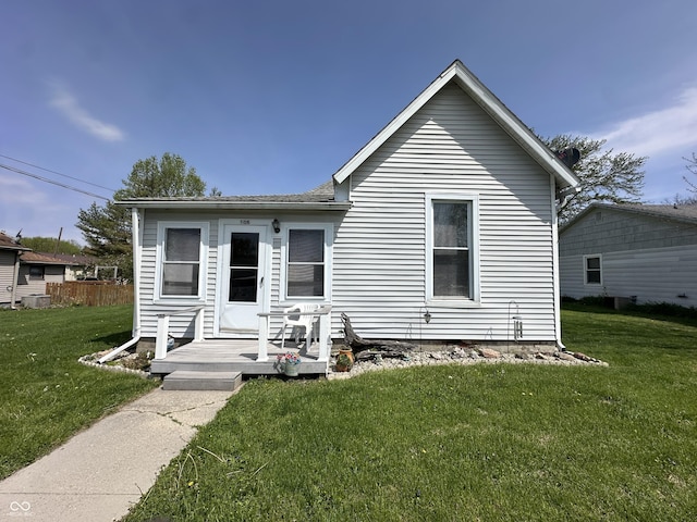 view of front of home with a front lawn