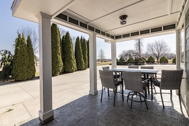 view of patio with outdoor dining area