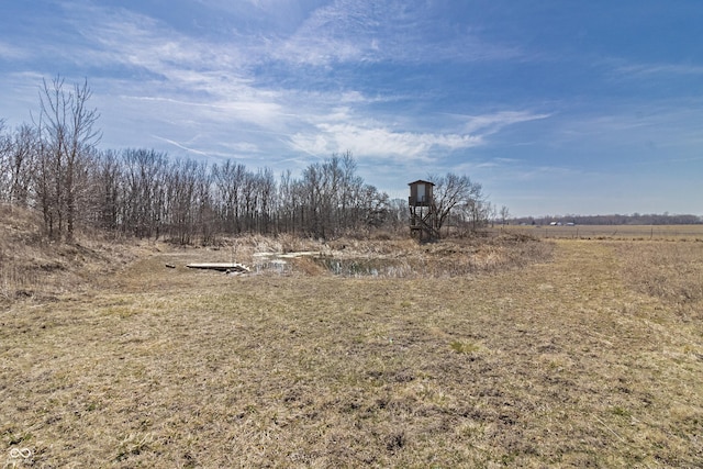 exterior space with a rural view