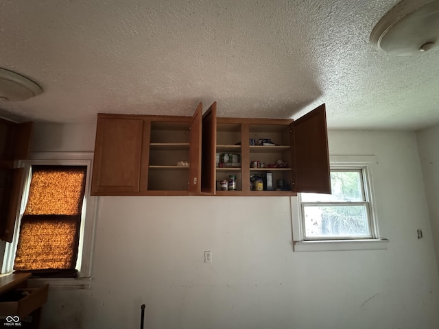 interior space with a textured ceiling