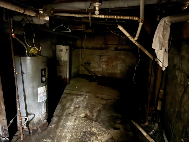 below grade area featuring water heater
