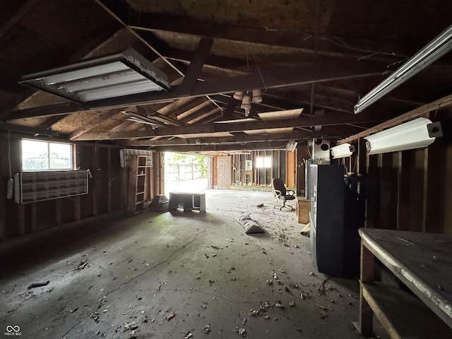 miscellaneous room featuring a garage and plenty of natural light