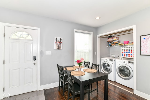 319 S Randolph St, Indianapolis, IN 46201 - washroom with baseboards, washer and clothes dryer, and wood finished floors