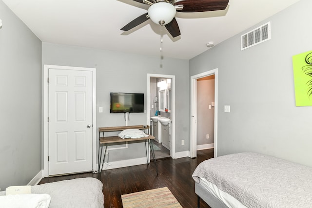 319 S Randolph St, Indianapolis, IN 46201 - bedroom with ceiling fan, visible vents, baseboards, dark wood-style floors, and ensuite bath
