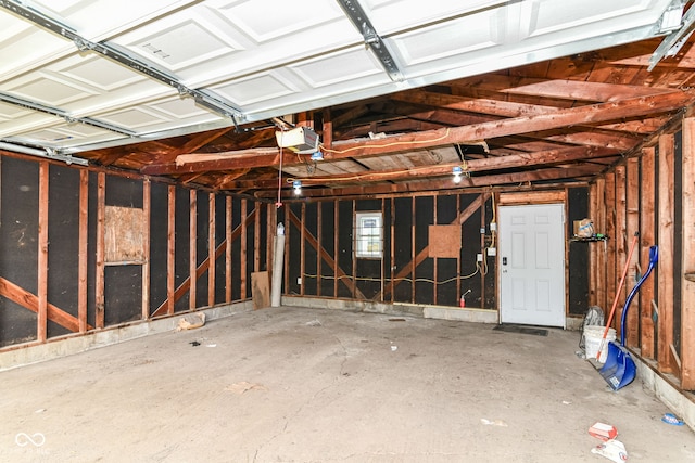 319 S Randolph St, Indianapolis, IN 46201 - garage featuring a garage door opener