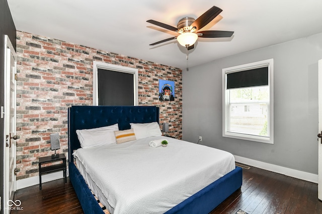 319 S Randolph St, Indianapolis, IN 46201 - bedroom with baseboards, ceiling fan, hardwood / wood-style flooring, and brick wall