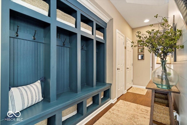 mudroom featuring recessed lighting, baseboards, and dark wood-style floors