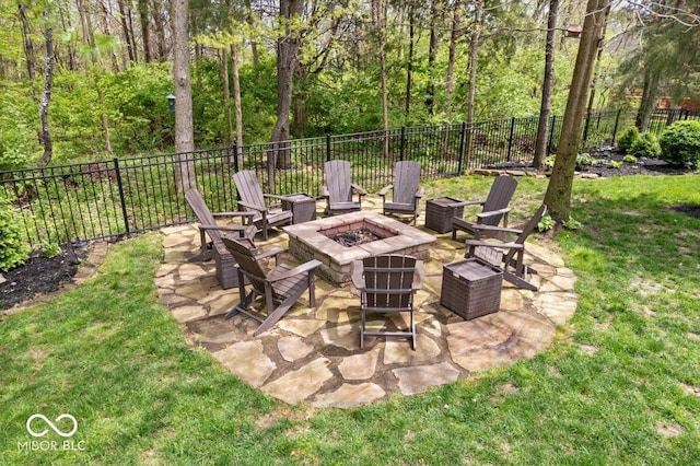 view of patio with fence and an outdoor fire pit