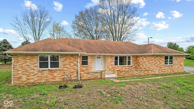 ranch-style home with brick siding