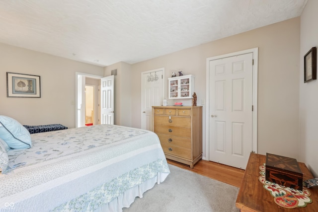1030 Stratford Hall Unit 17-3, Indianapolis, IN 46260 - bedroom featuring light wood-style floors