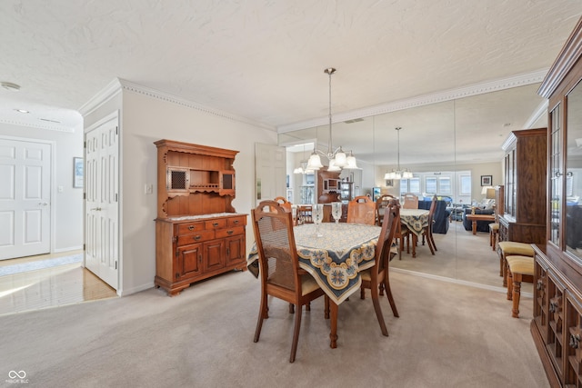 1030 Stratford Hall Unit 17-3, Indianapolis, IN 46260 - dining room featuring a chandelier, crown molding, and light carpet