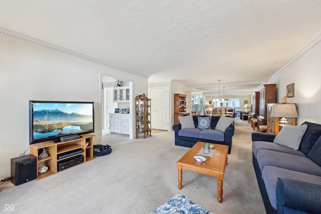 1030 Stratford Hall Unit 17-3, Indianapolis, IN 46260 - living area featuring crown molding, carpet, and a chandelier