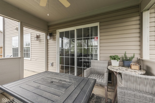exterior space featuring outdoor dining space and ceiling fan