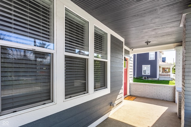 view of patio featuring a porch