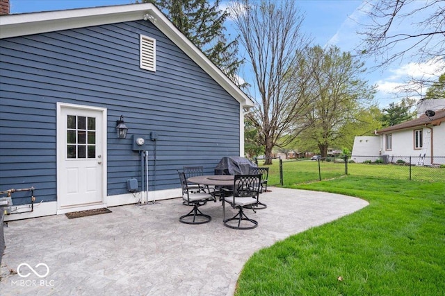view of patio / terrace featuring fence