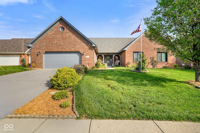 ranch-style home featuring a garage, a front lawn, brick siding, a shingled roof, and concrete driveway