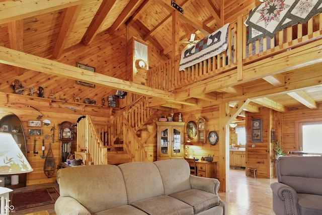 4840 N Templin Rd, Martinsville, IN 46151 - living room featuring wood walls, beam ceiling, high vaulted ceiling, stairs, and light wood-style flooring