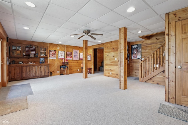 4840 N Templin Rd, Martinsville, IN 46151 - interior space featuring carpet flooring, stairs, a ceiling fan, and wooden walls