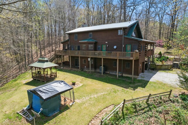 4840 N Templin Rd, Martinsville, IN 46151 - rear view of property featuring a gazebo, a yard, a deck, and metal roof