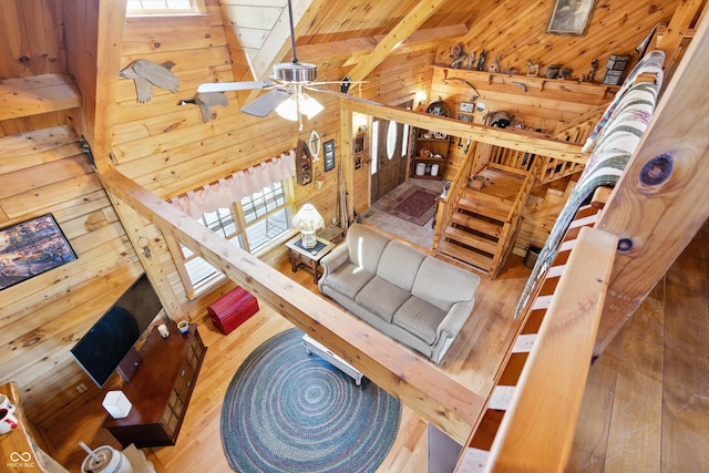 4840 N Templin Rd, Martinsville, IN 46151 - living room featuring wood-type flooring, wood walls, ceiling fan, and wooden ceiling