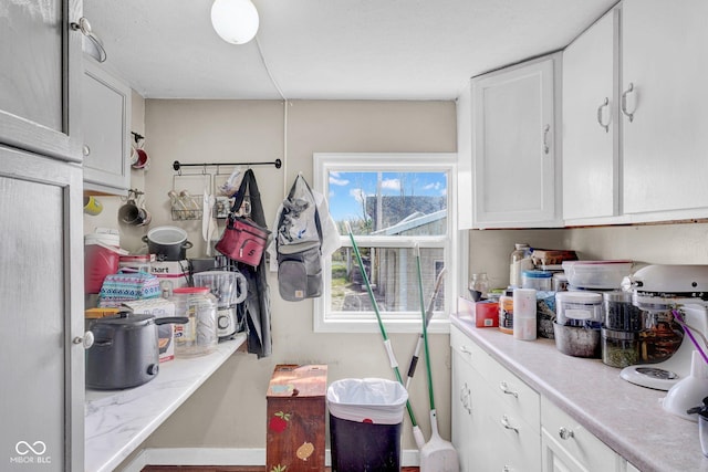 5780 S County Road 625 W, Reelsville, IN 46171 - kitchen featuring light countertops and white cabinetry