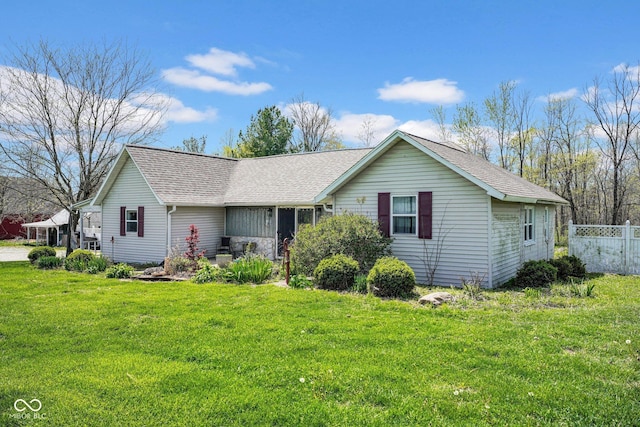 5780 S County Road 625 W, Reelsville, IN 46171 - ranch-style home with a front lawn, roof with shingles, and fence