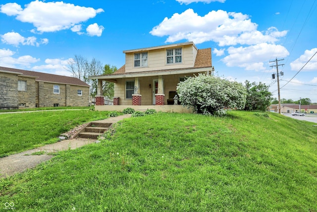 509 S Main St, Greencastle, IN 46135 - bungalow-style house featuring a front yard, a shingled roof, and covered porch