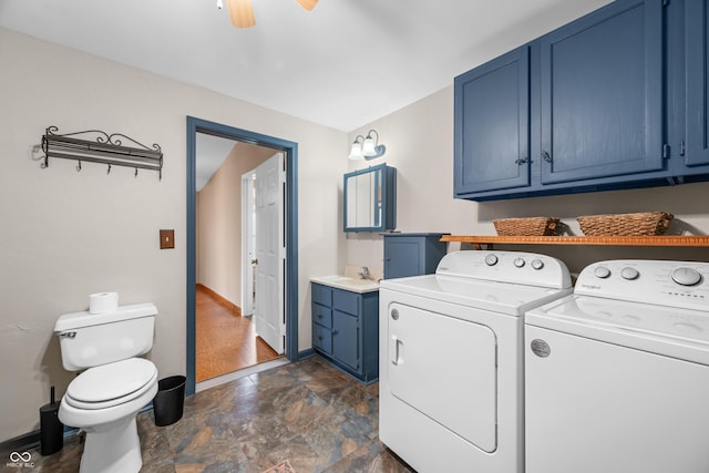 2513 Grandma Barnes Rd, Nashville, IN 47448 - laundry area with laundry area, baseboards, stone finish floor, washing machine and clothes dryer, and a ceiling fan