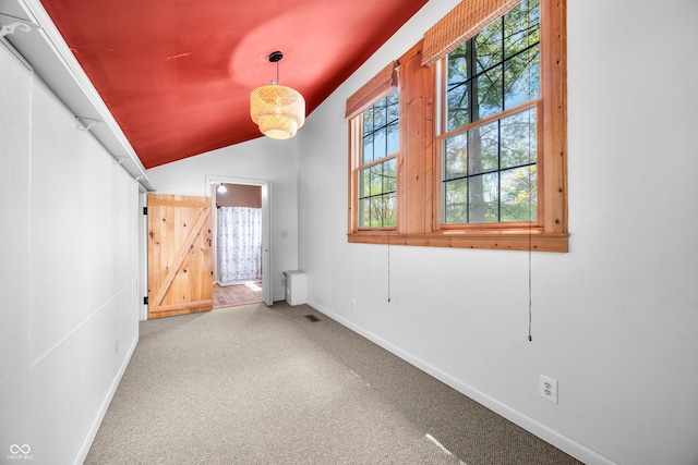 2513 Grandma Barnes Rd, Nashville, IN 47448 - empty room with carpet flooring, baseboards, and lofted ceiling