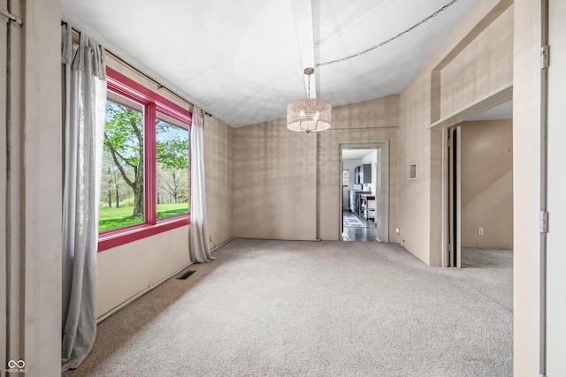 2513 Grandma Barnes Rd, Nashville, IN 47448 - empty room with carpet flooring, visible vents, and an inviting chandelier