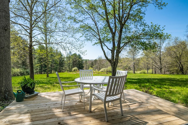 2513 Grandma Barnes Rd, Nashville, IN 47448 - wooden deck featuring a lawn, a wooded view, and outdoor dining area