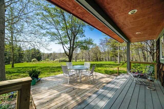 2513 Grandma Barnes Rd, Nashville, IN 47448 - wooden deck featuring outdoor dining space and a yard