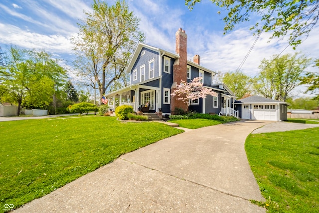 view of front of property featuring a chimney, concrete driveway, a porch, and a front lawn
