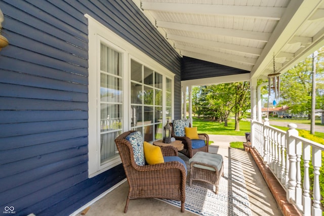 view of patio featuring a porch