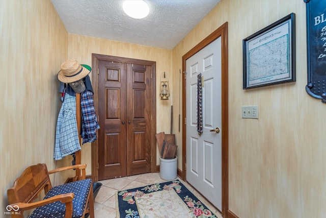 7020 N 375 E, Lebanon, IN 46052 - entryway with a textured ceiling and light tile patterned flooring
