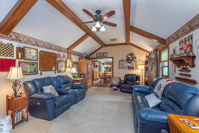 7020 N 375 E, Lebanon, IN 46052 - living room with ceiling fan, visible vents, lofted ceiling with beams, carpet, and wallpapered walls