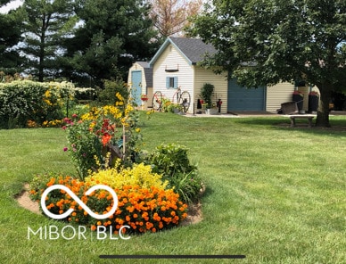 7020 N 375 E, Lebanon, IN 46052 - view of yard with an outbuilding and a garage
