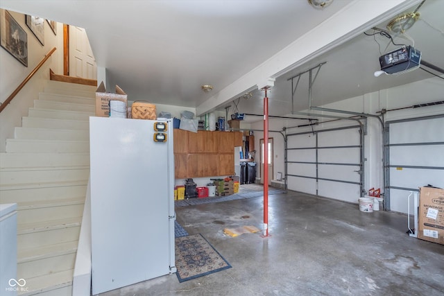 7020 N 375 E, Lebanon, IN 46052 - garage with freestanding refrigerator and a garage door opener