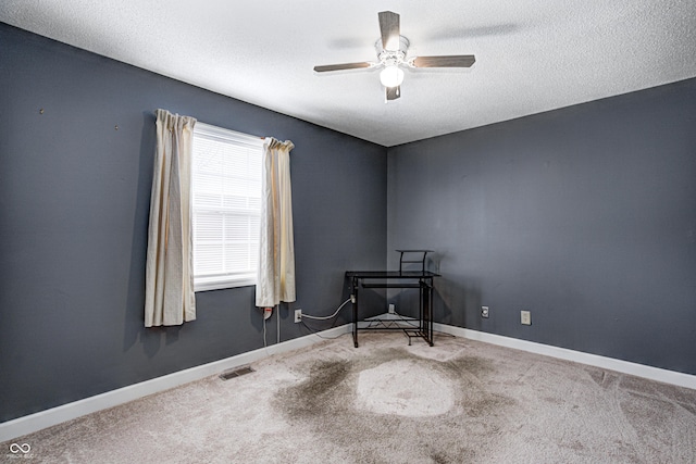 6814 Summer Time Dr, Indianapolis, IN 46226 - spare room featuring a ceiling fan, baseboards, visible vents, and carpet