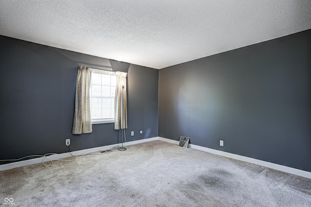 6814 Summer Time Dr, Indianapolis, IN 46226 - empty room with carpet flooring, a textured ceiling, and baseboards