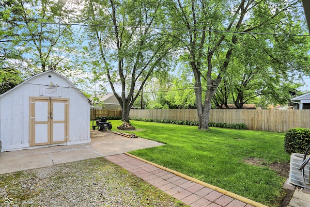 2307 Magnolia Pl, Indianapolis, IN 46219 - view of yard with a storage shed, an outbuilding, and a patio
