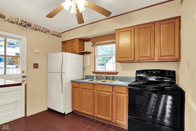 2307 Magnolia Pl, Indianapolis, IN 46219 - kitchen with black range with electric stovetop, a sink, freestanding refrigerator, dark tile patterned flooring, and ceiling fan
