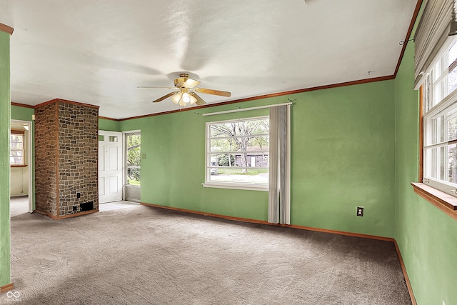 2307 Magnolia Pl, Indianapolis, IN 46219 - carpeted spare room with ceiling fan, baseboards, and ornamental molding