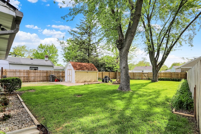 2307 Magnolia Pl, Indianapolis, IN 46219 - view of yard featuring a storage unit and an outbuilding