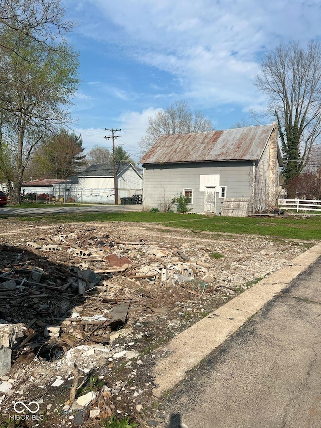 307 N Main St, Carthage, IN 46115 - view of home's exterior with an outbuilding
